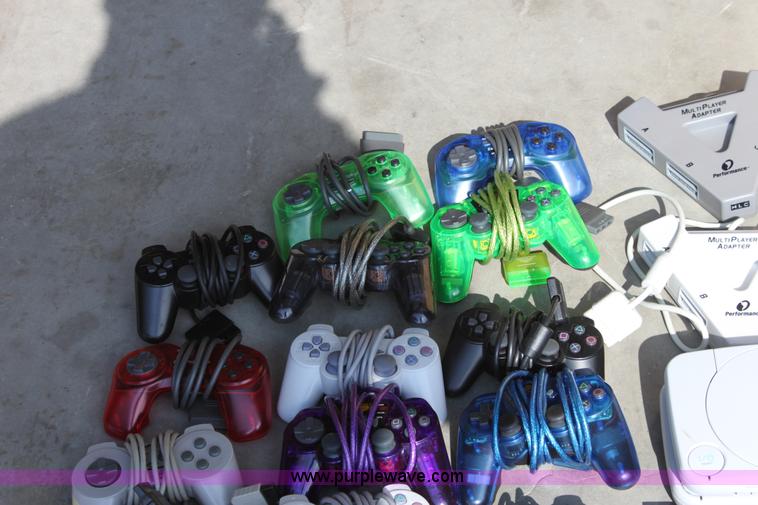 image for item A2797 Assorted Sony Playstation game consoles and more