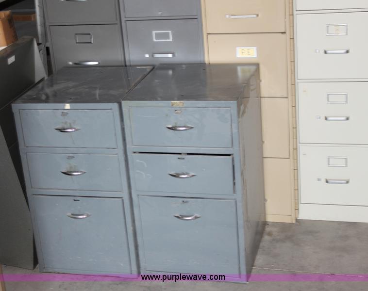 image for item A2806 (9) file cabinets