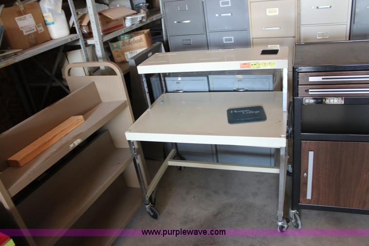 image for item A2811 (7) assorted rolling carts and cabinets