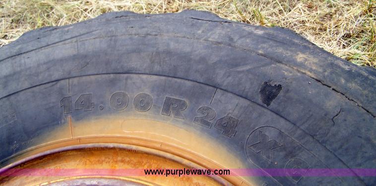 image for item E9278 14.00R24 tire and wheel
