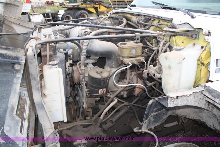 image for item A2337 1989 Ford F700 flatbed truck