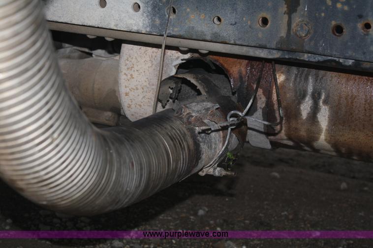 image for item A2337 1989 Ford F700 flatbed truck