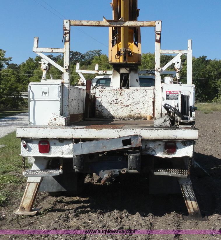 image for item A3107 1987 Ford F800 digger truck