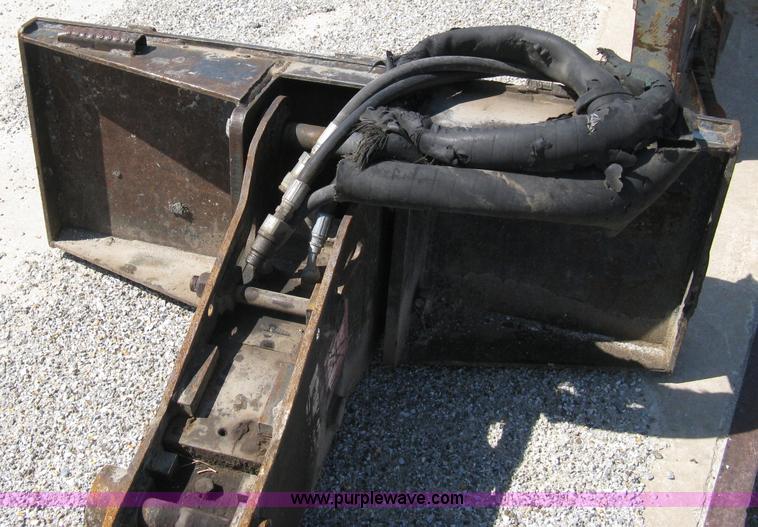 image for item A4351 Huskie breaker skid steer attachment