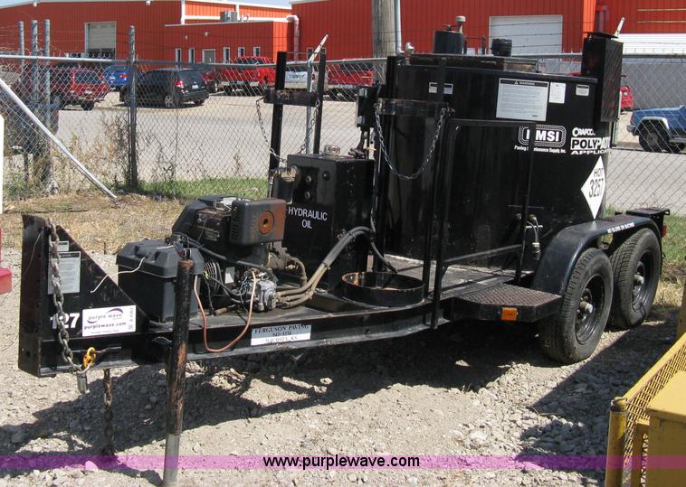 image for item A4362 2001 Crafco 1 Ton Poly Patch applicator