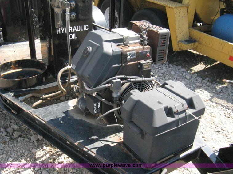 image for item A4362 2001 Crafco 1 Ton Poly Patch applicator