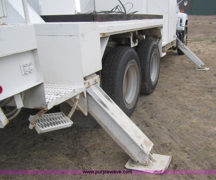 image for item C9754 1998 GMC C8500 bucket digger truck