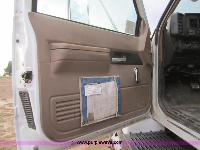 image for item C9754 1998 GMC C8500 bucket digger truck