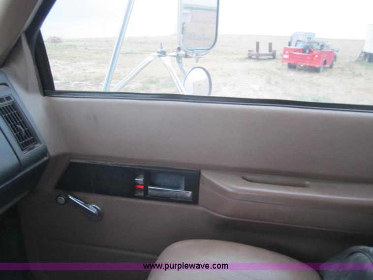 image for item C9754 1998 GMC C8500 bucket digger truck