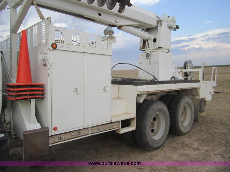 image for item C9754 1998 GMC C8500 bucket digger truck