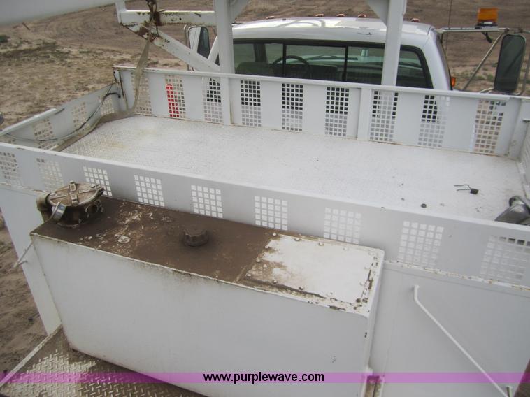 image for item C9754 1998 GMC C8500 bucket digger truck