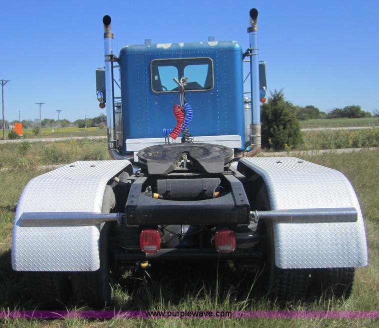 image for item C5037 1988 Freightliner FLC 64T semi truck