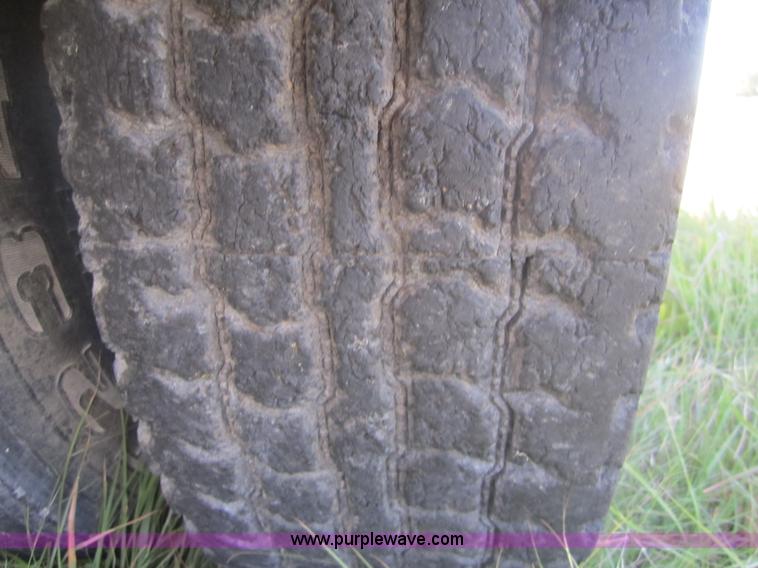 image for item C5037 1988 Freightliner FLC 64T semi truck