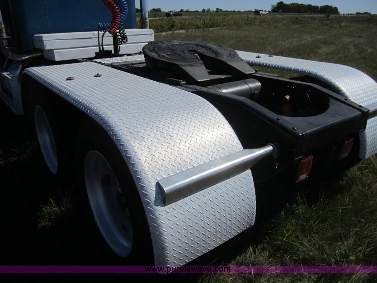 image for item C5037 1988 Freightliner FLC 64T semi truck