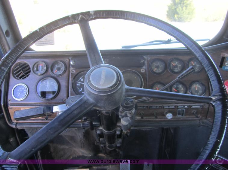 image for item C5037 1988 Freightliner FLC 64T semi truck