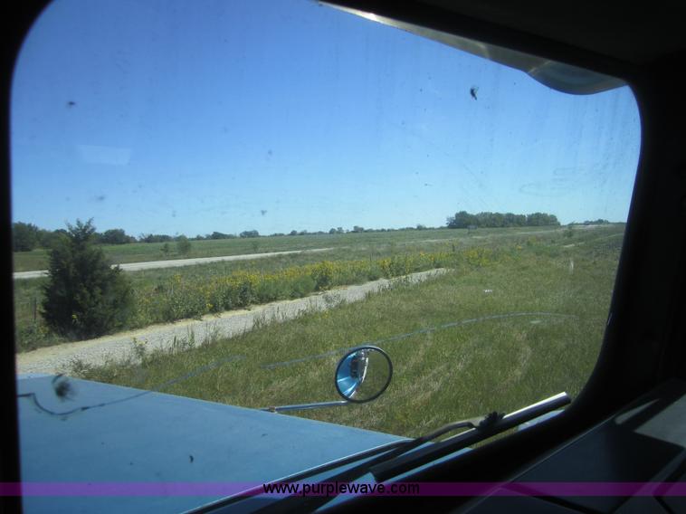 image for item C5037 1988 Freightliner FLC 64T semi truck