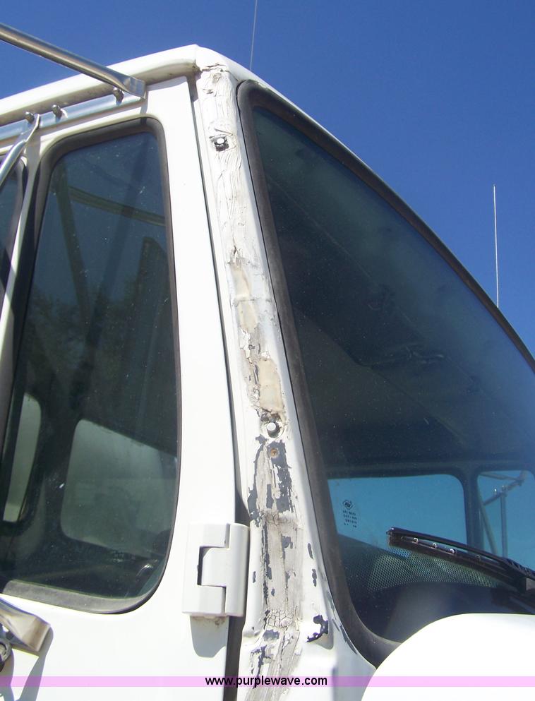 image for item D8505 1995 Freightliner FL70 fuel tanker truck