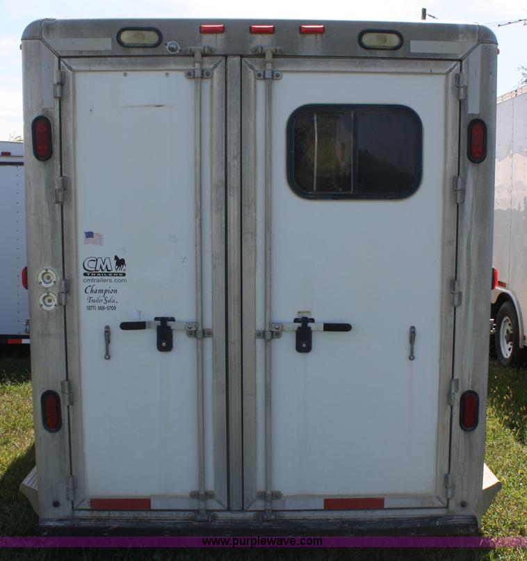 image for item A2375 2004 Norstar Cimarron three horse slant trailer