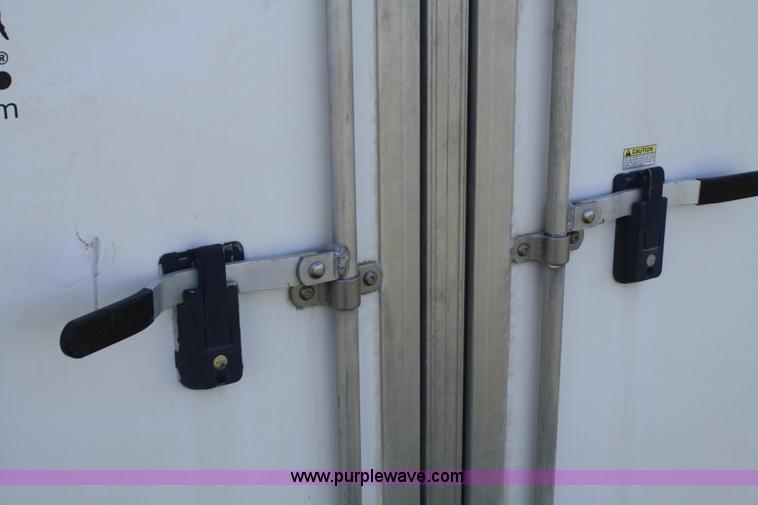 image for item A2375 2004 Norstar Cimarron three horse slant trailer