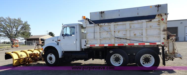 image for item A2413 1995 International 4900 tandem axle dump truck with plow and spreader