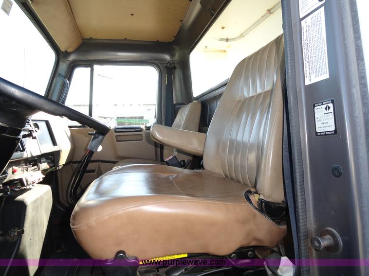 image for item A2413 1995 International 4900 tandem axle dump truck with plow and spreader