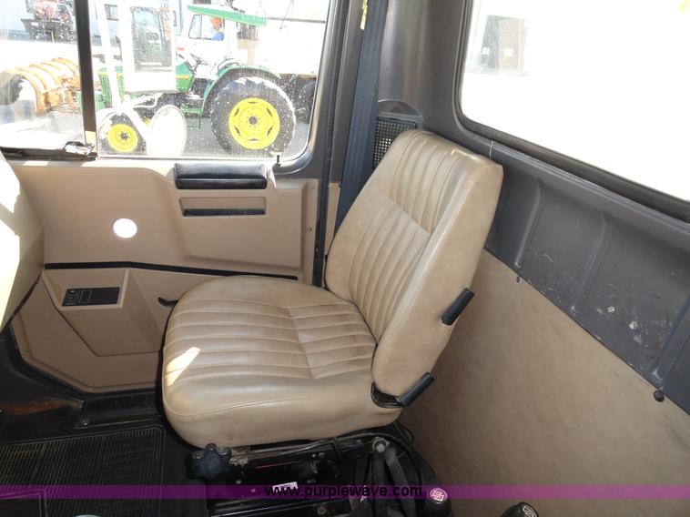 image for item A2413 1995 International 4900 tandem axle dump truck with plow and spreader