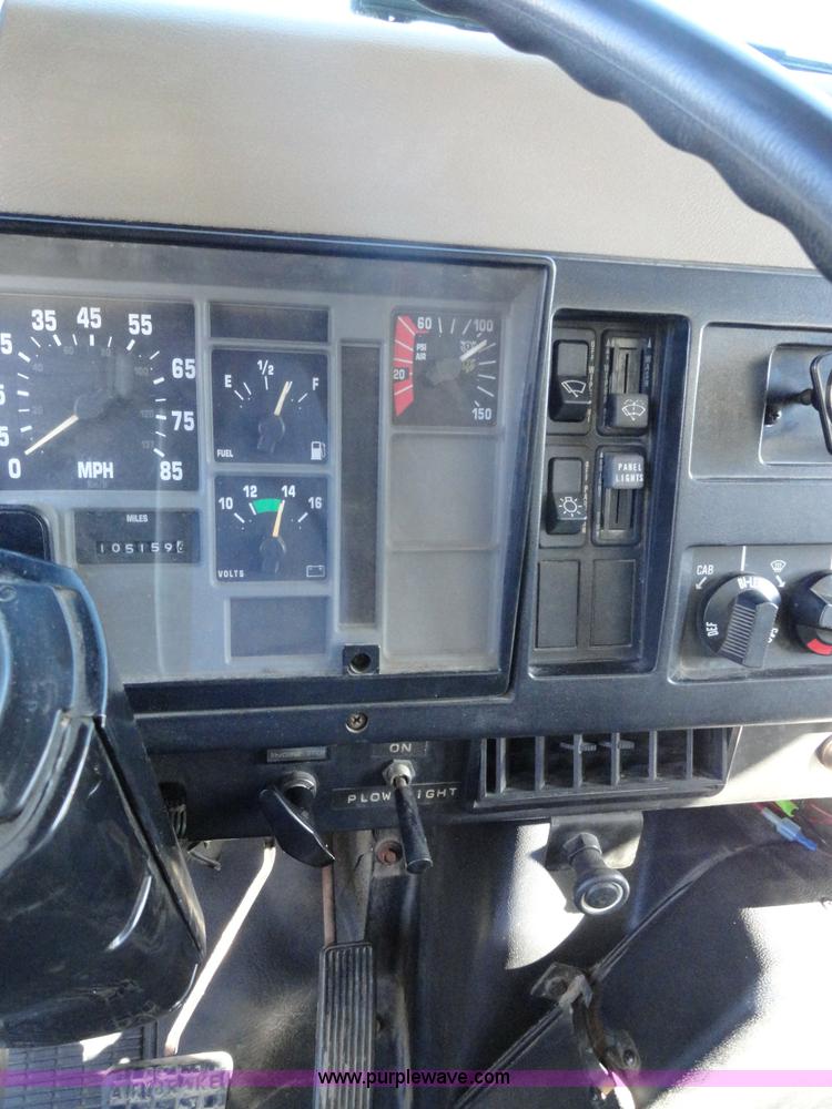 image for item A2413 1995 International 4900 tandem axle dump truck with plow and spreader