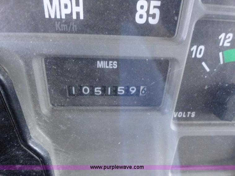 image for item A2413 1995 International 4900 tandem axle dump truck with plow and spreader