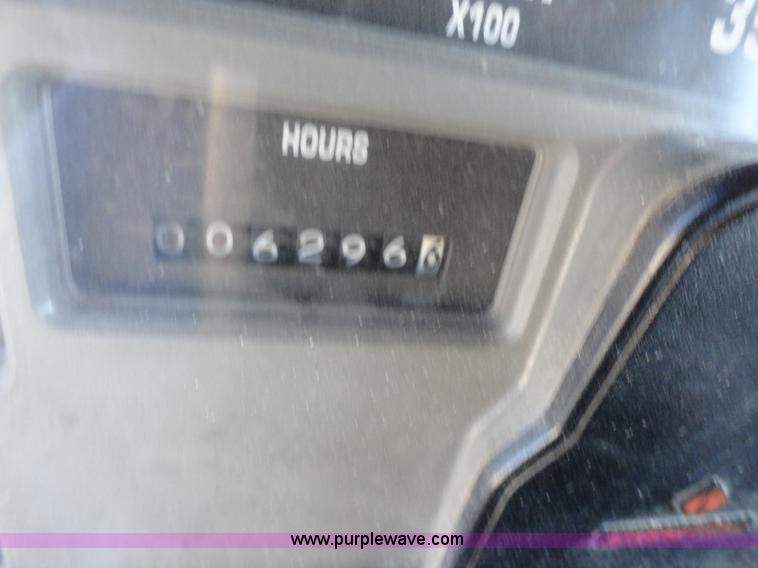 image for item A2413 1995 International 4900 tandem axle dump truck with plow and spreader