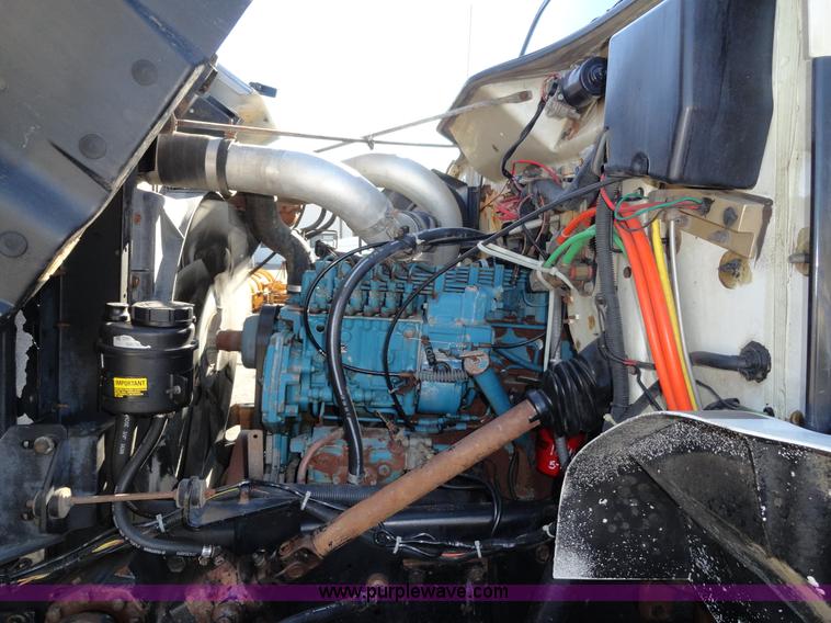 image for item A2413 1995 International 4900 tandem axle dump truck with plow and spreader