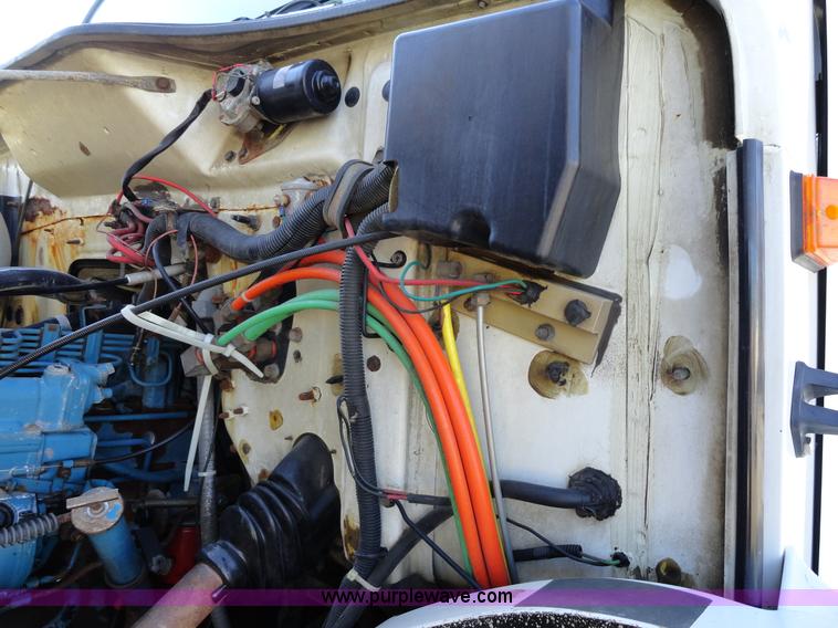 image for item A2413 1995 International 4900 tandem axle dump truck with plow and spreader