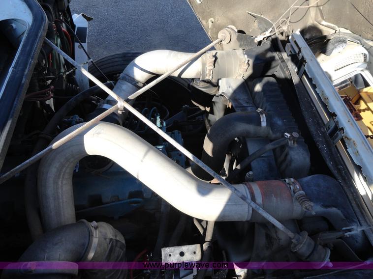 image for item A2413 1995 International 4900 tandem axle dump truck with plow and spreader