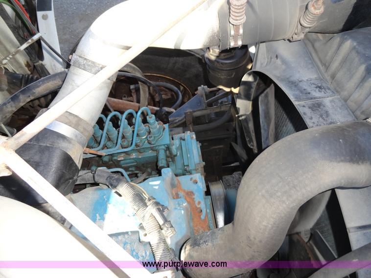 image for item A2413 1995 International 4900 tandem axle dump truck with plow and spreader