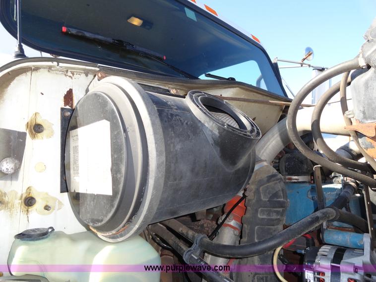 image for item A2413 1995 International 4900 tandem axle dump truck with plow and spreader