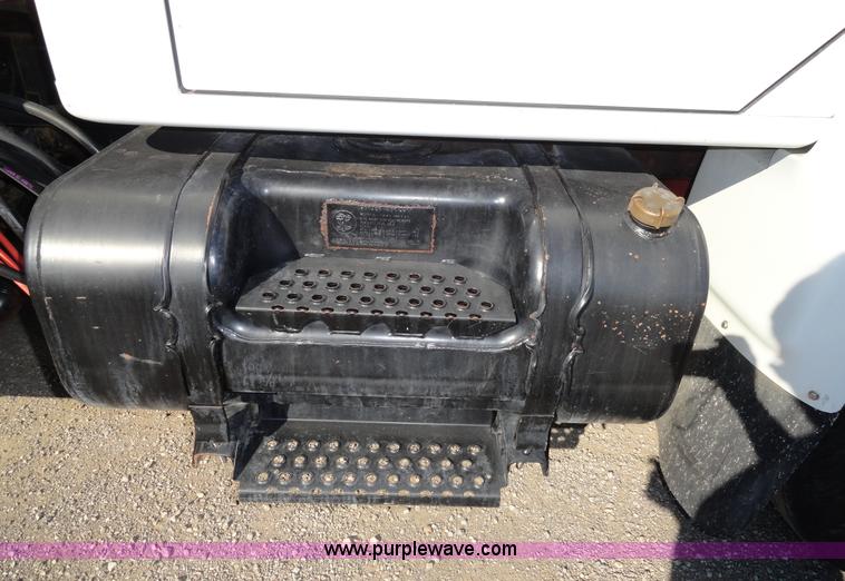 image for item A2413 1995 International 4900 tandem axle dump truck with plow and spreader