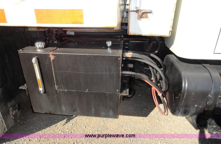 image for item A2413 1995 International 4900 tandem axle dump truck with plow and spreader