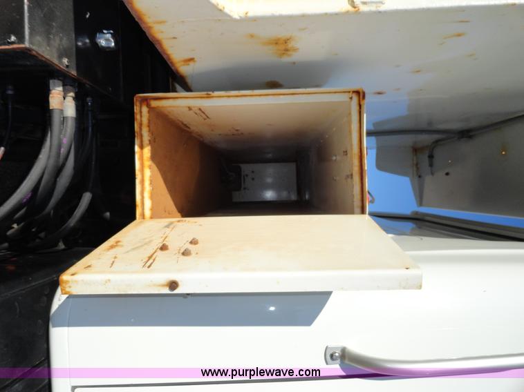 image for item A2413 1995 International 4900 tandem axle dump truck with plow and spreader