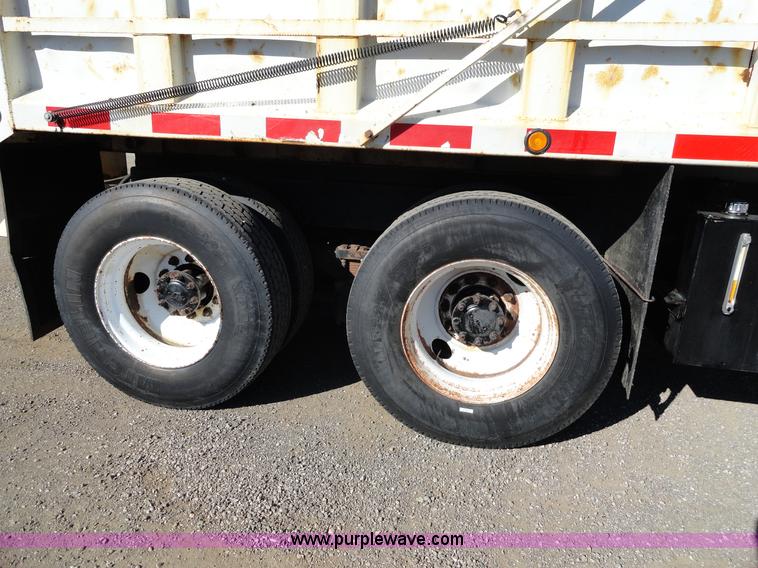 image for item A2413 1995 International 4900 tandem axle dump truck with plow and spreader