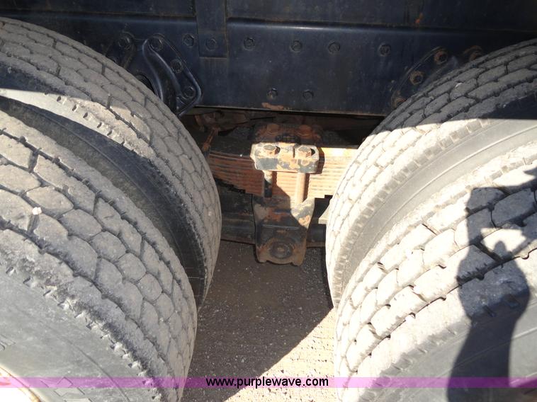 image for item A2413 1995 International 4900 tandem axle dump truck with plow and spreader