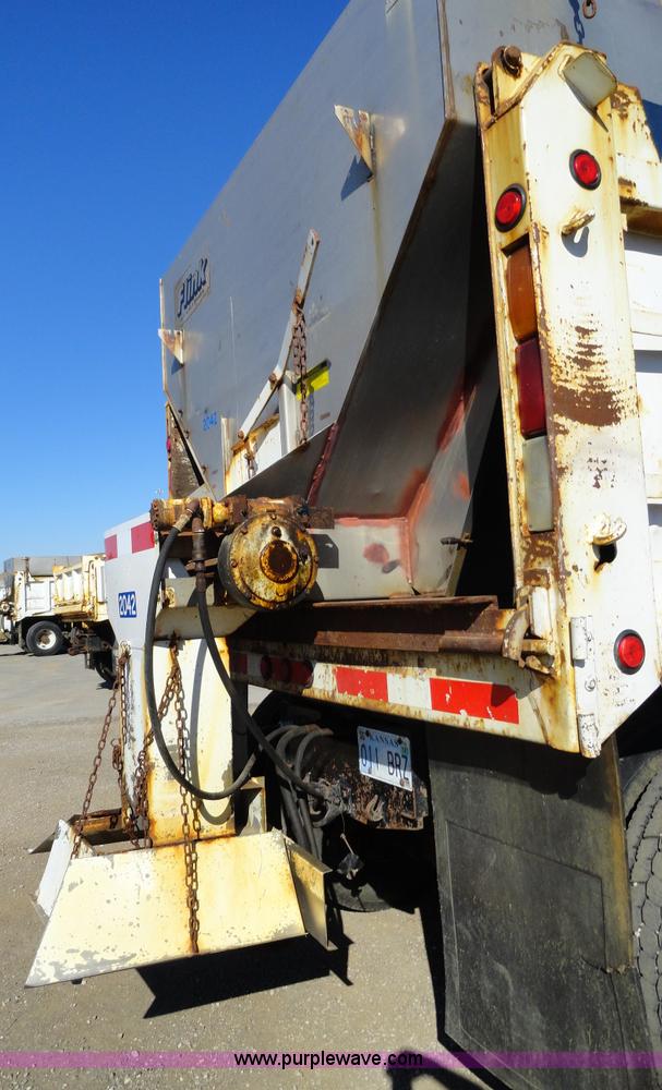 image for item A2413 1995 International 4900 tandem axle dump truck with plow and spreader