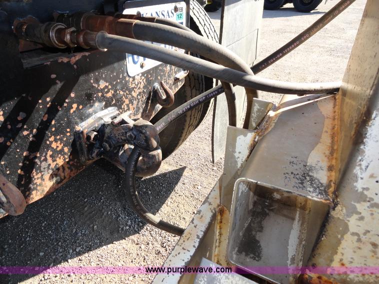 image for item A2413 1995 International 4900 tandem axle dump truck with plow and spreader