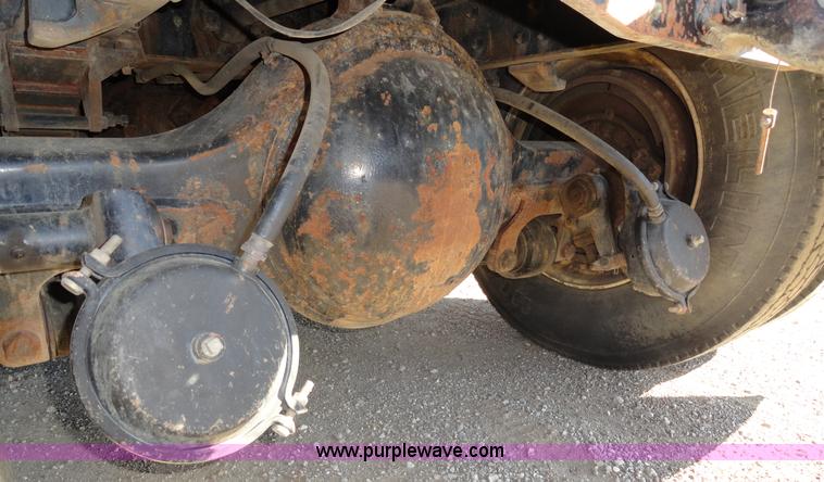 image for item A2413 1995 International 4900 tandem axle dump truck with plow and spreader