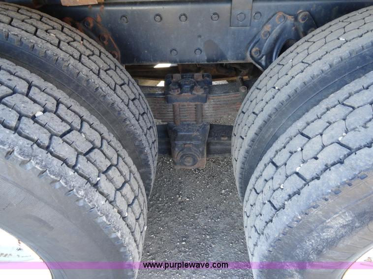 image for item A2413 1995 International 4900 tandem axle dump truck with plow and spreader