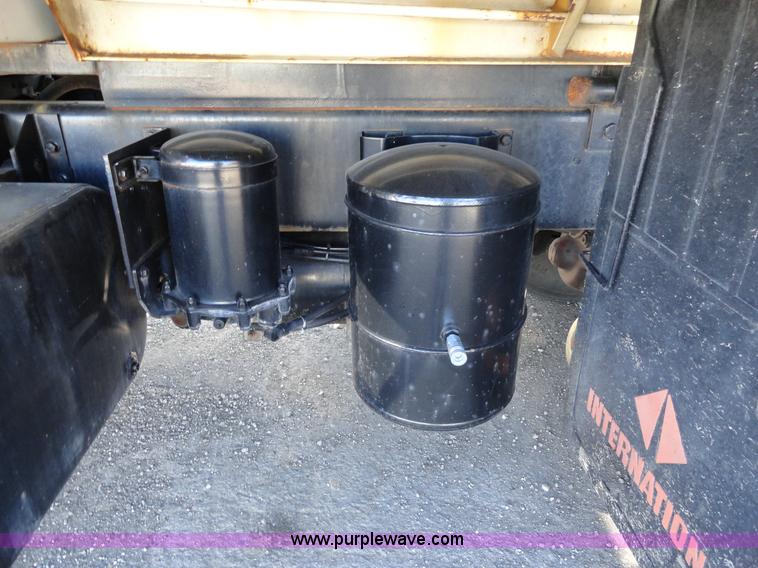 image for item A2413 1995 International 4900 tandem axle dump truck with plow and spreader