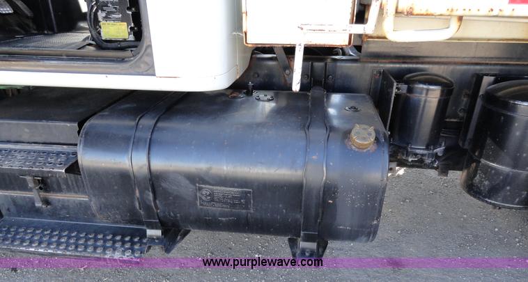 image for item A2413 1995 International 4900 tandem axle dump truck with plow and spreader