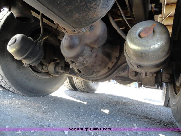 image for item A2413 1995 International 4900 tandem axle dump truck with plow and spreader