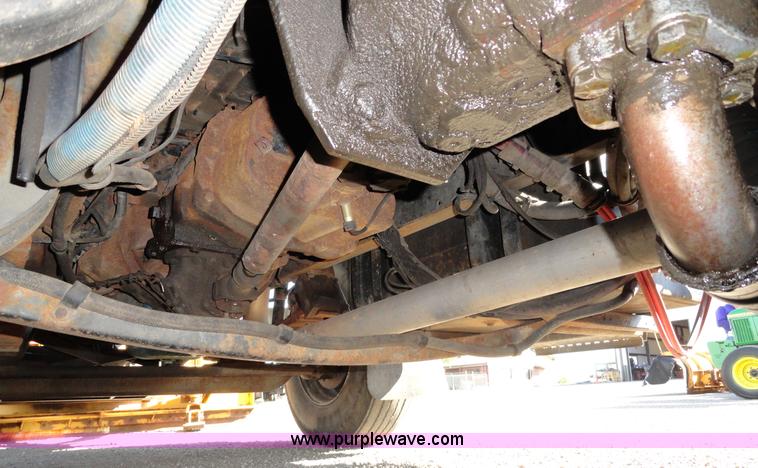 image for item A2413 1995 International 4900 tandem axle dump truck with plow and spreader