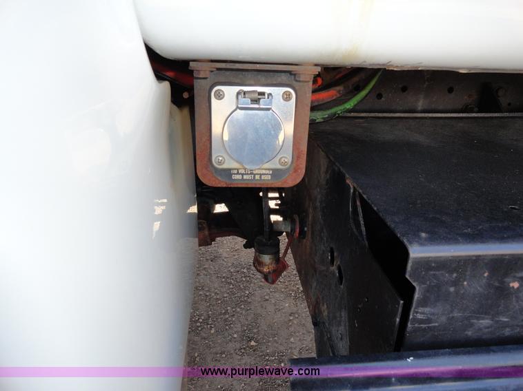 image for item A2413 1995 International 4900 tandem axle dump truck with plow and spreader