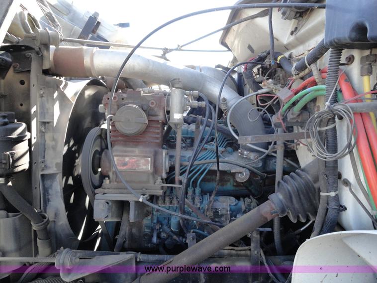 image for item A2417 1992 International 4900 tandem axle dump truck with plow and spreader