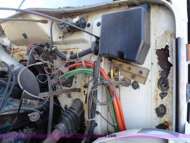 image for item A2417 1992 International 4900 tandem axle dump truck with plow and spreader